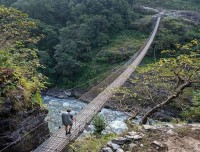 crossing-a suspension-bridge-during-trekking