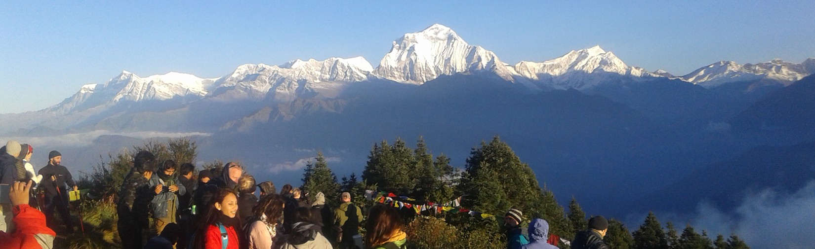 Ghorepani-Poon-Hill-Trek-travelers-watching-sunrise-view-from-poon-hill-view-point